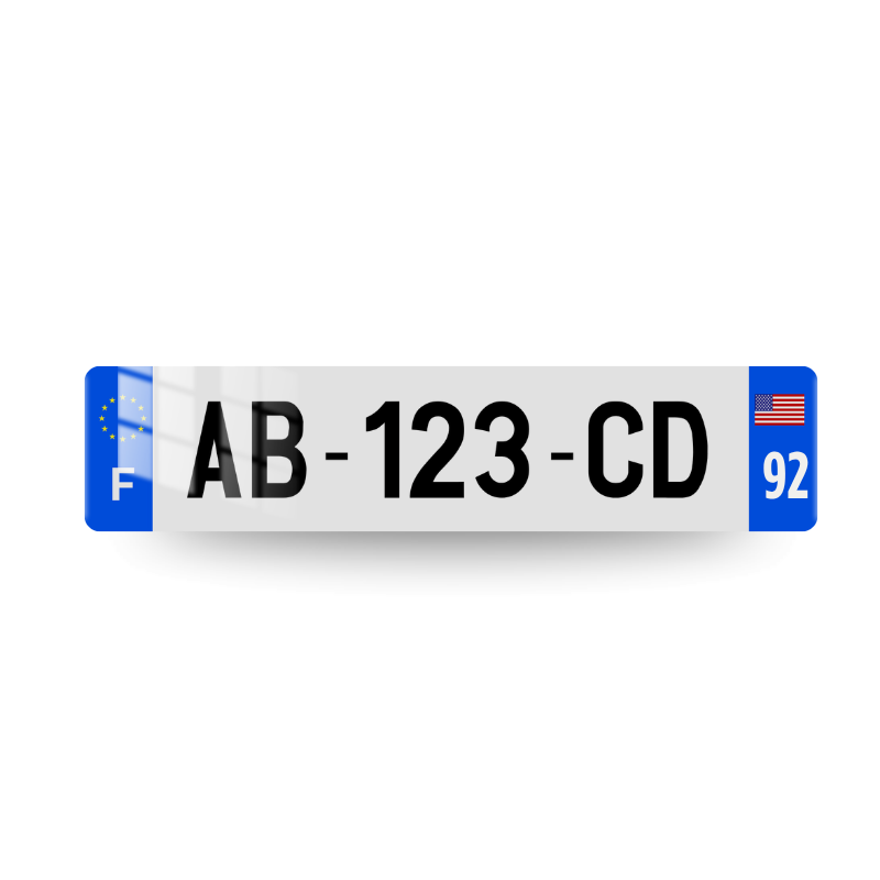 Plaque immatriculation française avec drapeau USA et code postal sur deux chiffres sur l'eurobande droite et lettrage F et logo UE sur l'eurobande gauche.