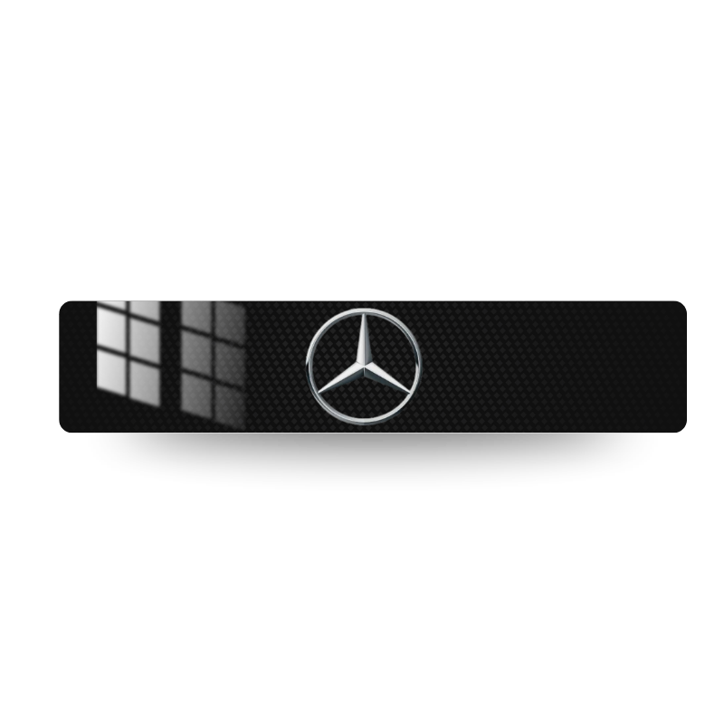 Plaque décorative Mercedes, étoile Mercedes chromée au centre d'un fond noir à trame carbone